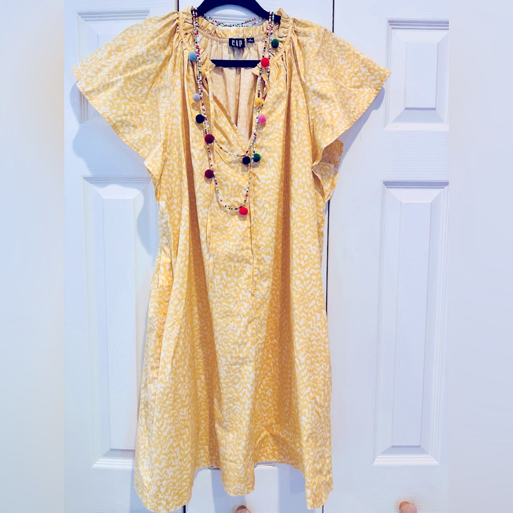 Size Large. GAP woman’s flutter sleeve dress.